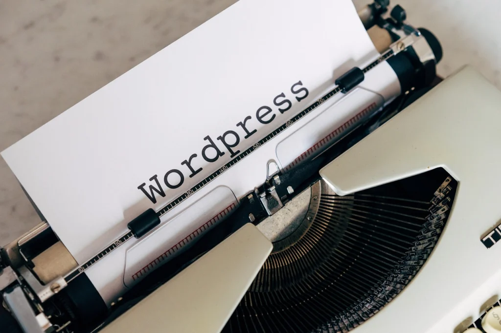 WordPress block editor showing heading and image blocks on a page